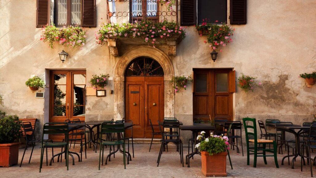Retro romantic restaurant, cafe in a small Italian town.